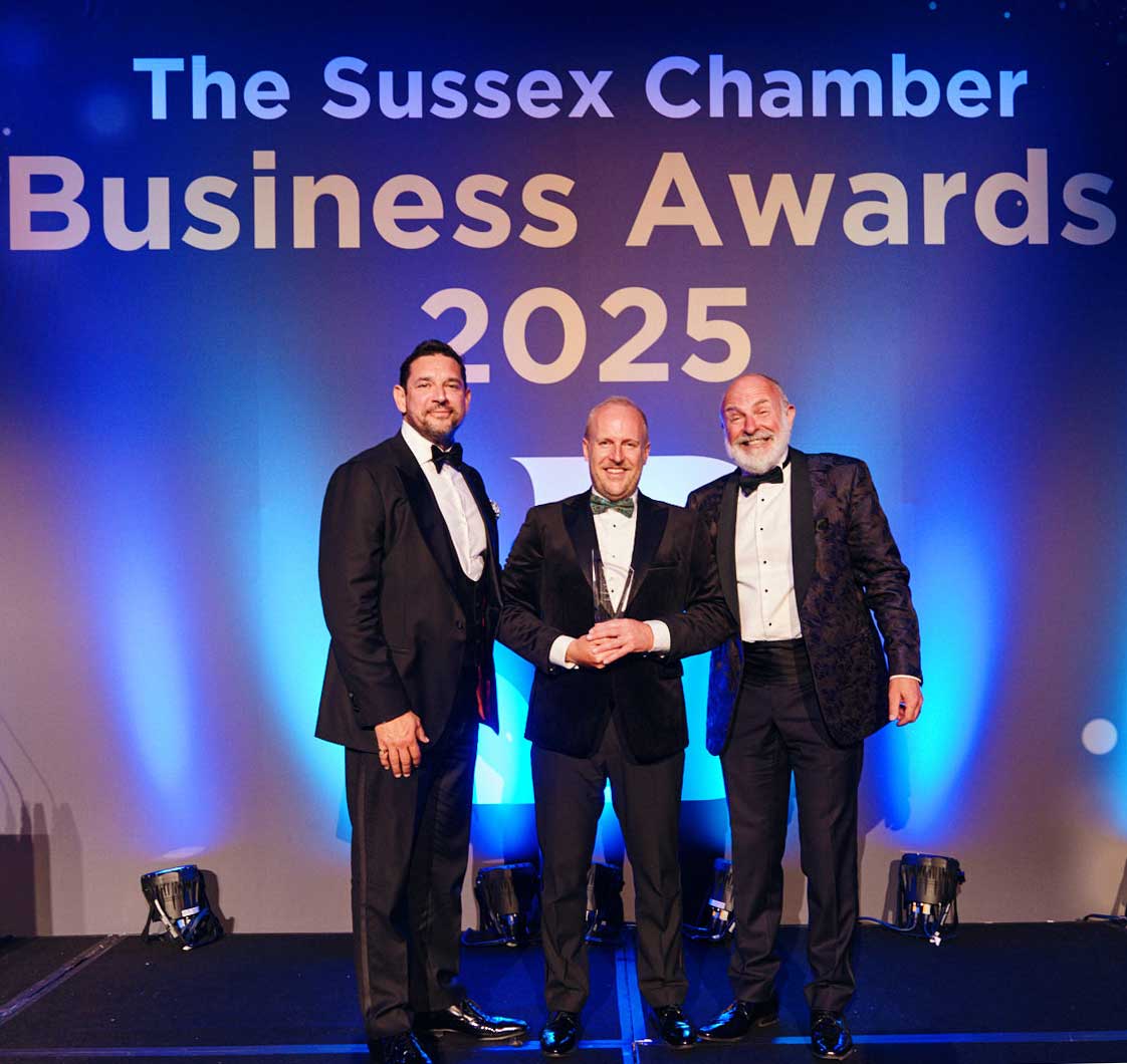Sussex Chamber 2025 Awards Andrew Tucknott receiving Entrepreneur of the Year Award 2025 on stage
