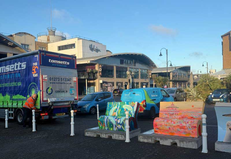 Colourful Amaze charity benches delivered in Brighton 